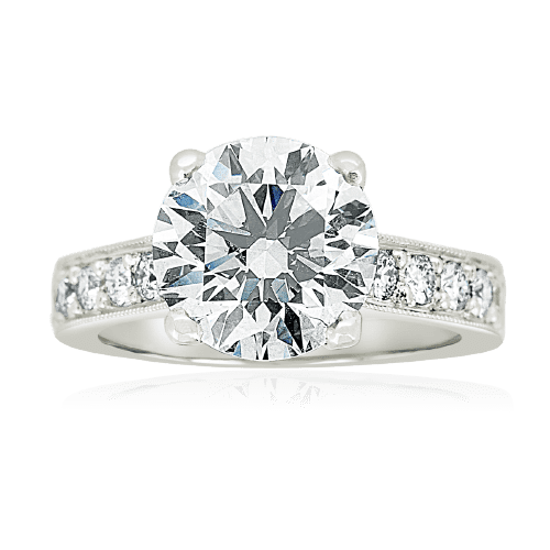 Round brilliant cut bezel set diamond engagement ring
