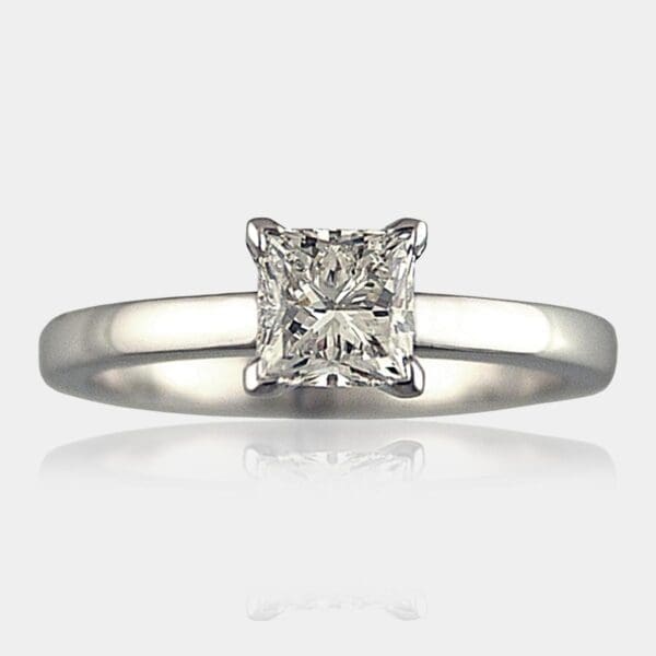 Princess cut diamond engagement ring with fine v shaped claws.