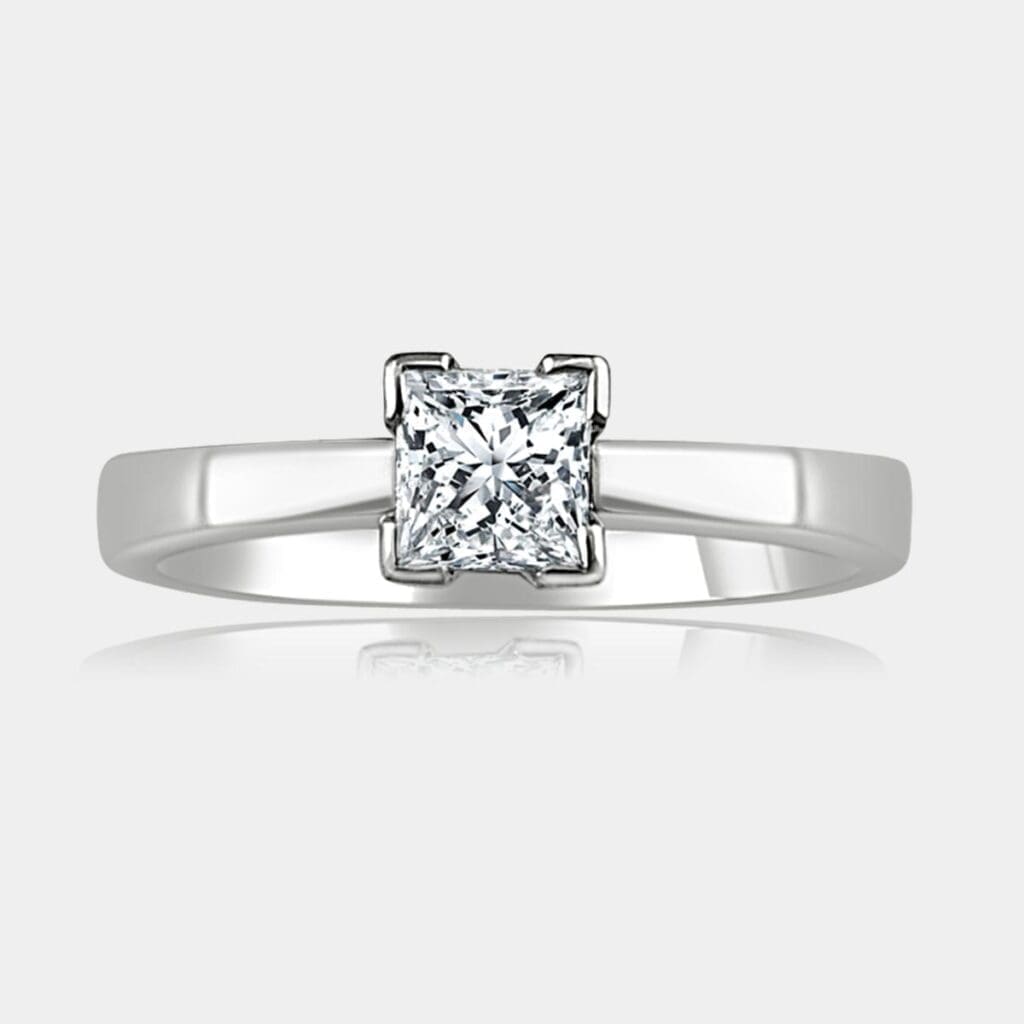 Princess cut diamond engagement ring with tapered band.