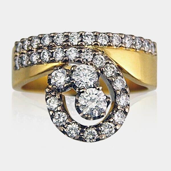 Swirl diamond engagement ring set in yellow and white gold.
