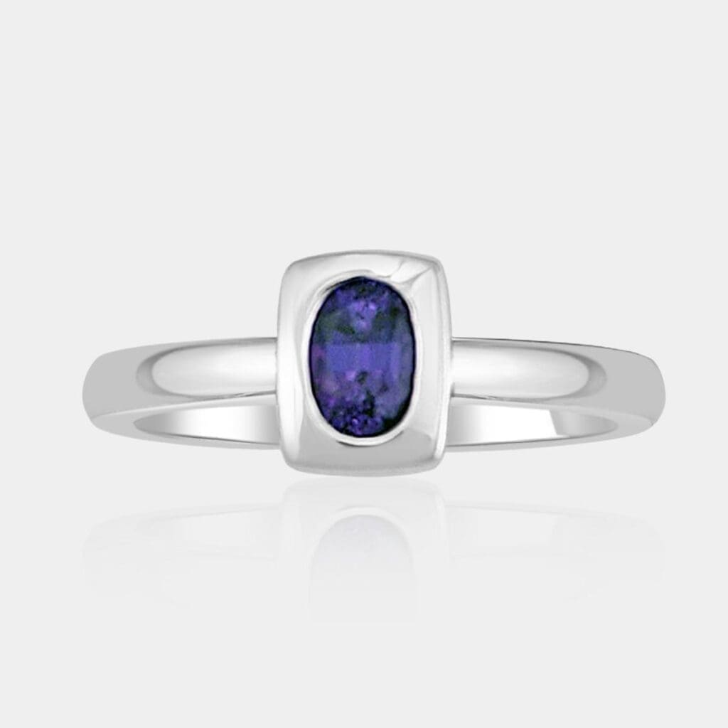Handmade oval cut alexandrite engagement ring in 18ct white gold.