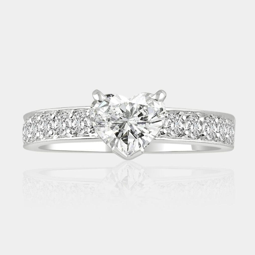 1.00 carat Heart shape diamond ring with bead set shoulder diamonds.