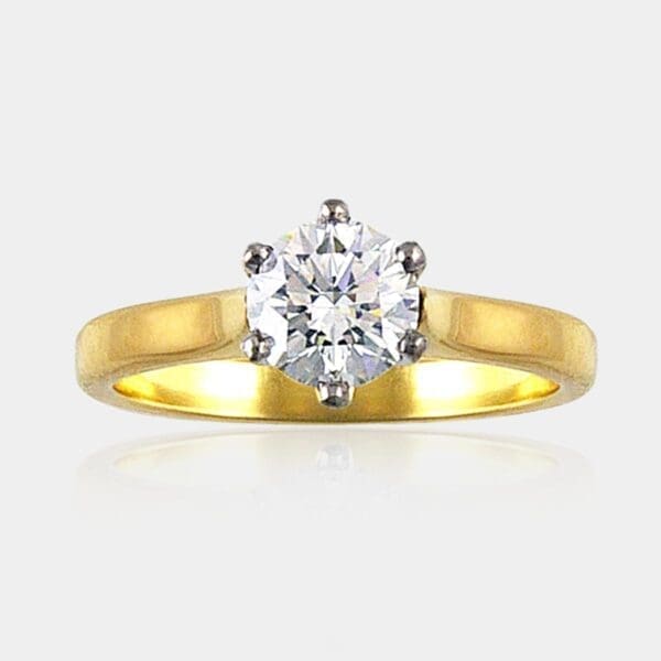 1.00 carat Round brilliant cut solitaire diamond ring with 18ct white gold 6 claws setting and 18ct yellow gold band.