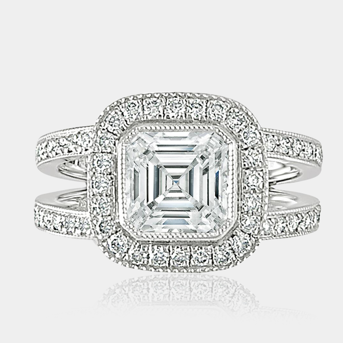 1.60 carat Asscher cut diamond ring featuring round brilliant cut diamond halo and split band with round brilliant cut bead set diamonds.