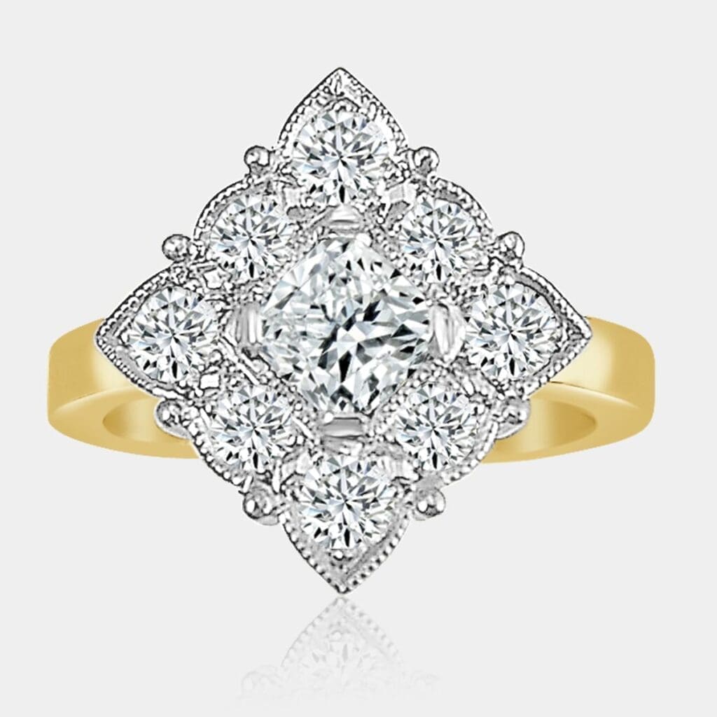 Radiant cut diamond engagement ring set in 18ct white and yellow gold with 0.50 carat centre diamond.