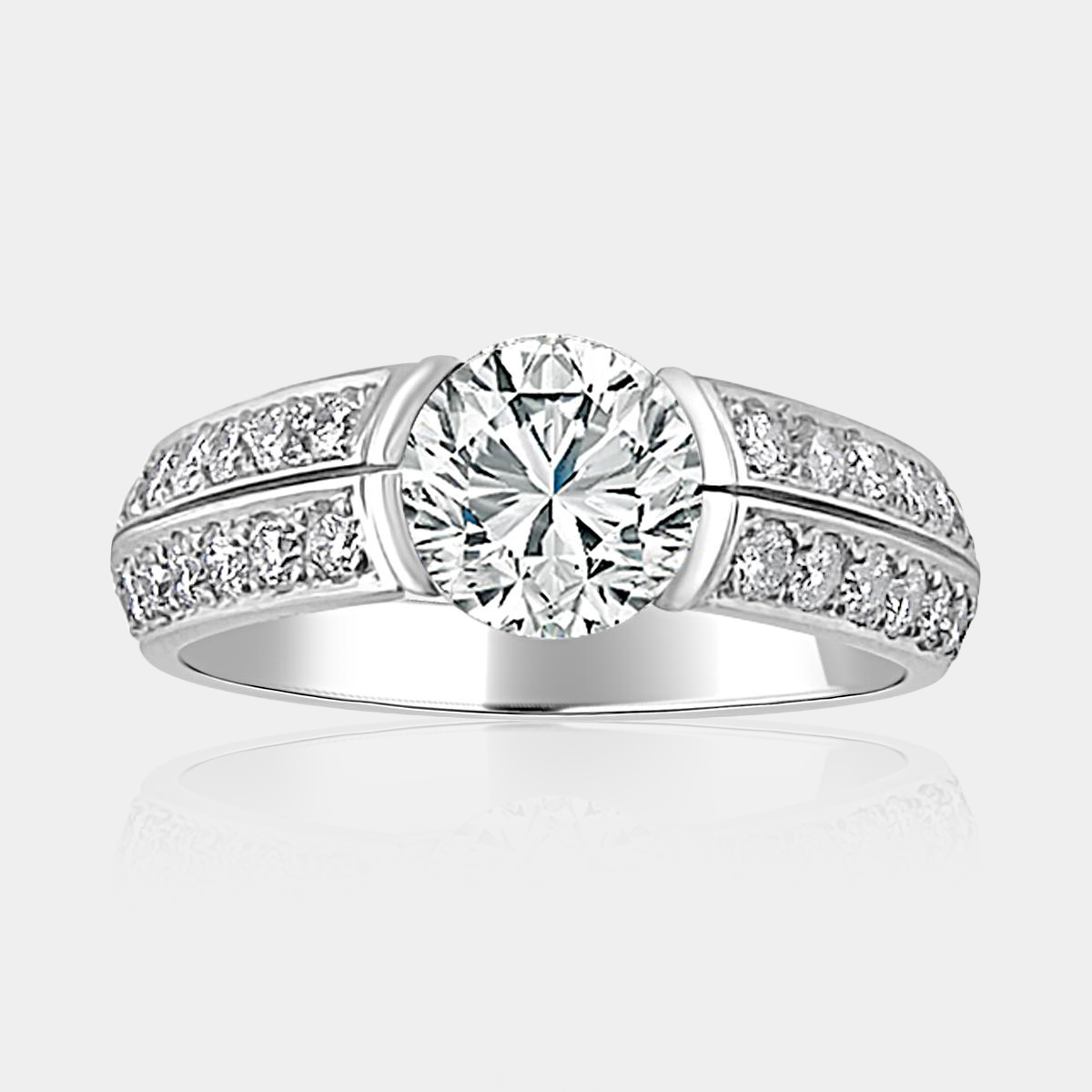 1.60 carat Round brilliant cut diamond ring with 2 rows of shoulder diamonds.