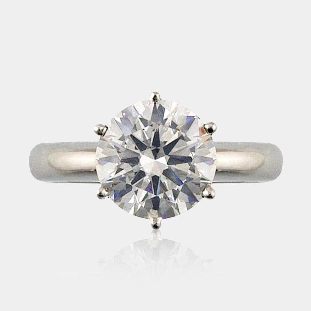 3.00 carat Diamond with six claw setting in a simple platinum engagement ring.