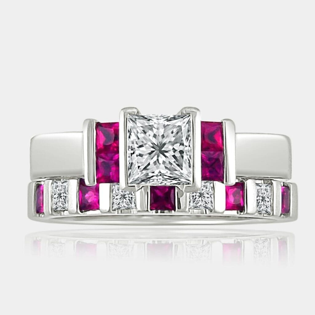 Princess cut diamond ring with bar set princess cut pink sapphires and matching wedding ring with alterting princess cut diamonds and pink sapphires.
