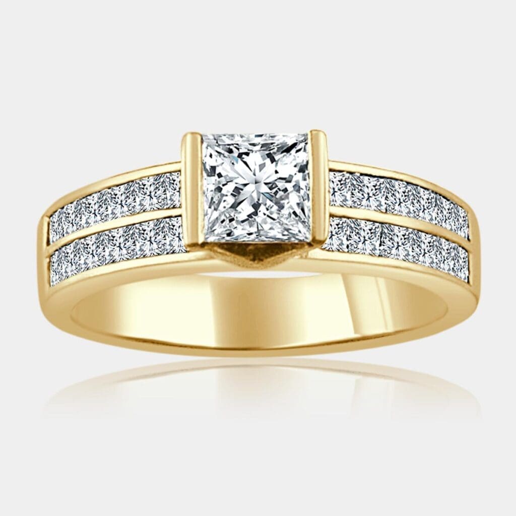 1.00 carat Princess cut diamond ring with 2 rows of channel set princess cut shoulder diamonds.