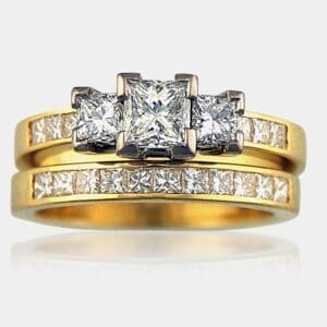 3 stone princess cut diamond engagement ring with princess cut shoulder diamonds and matching diamond wedding band.