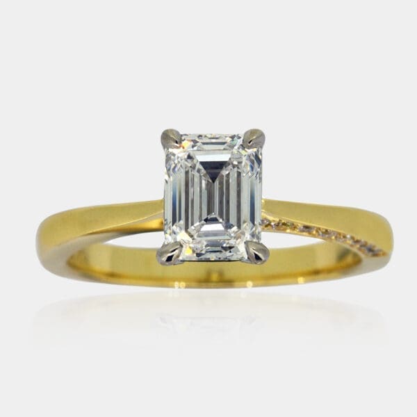 Emerald Cut Solitaire Diamond Engagement Ring with hidden diamond band