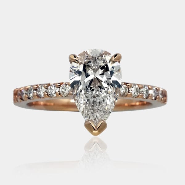 Pear Shaped Solitaire Ring with Diamond Band in 18ct Rose Gold
