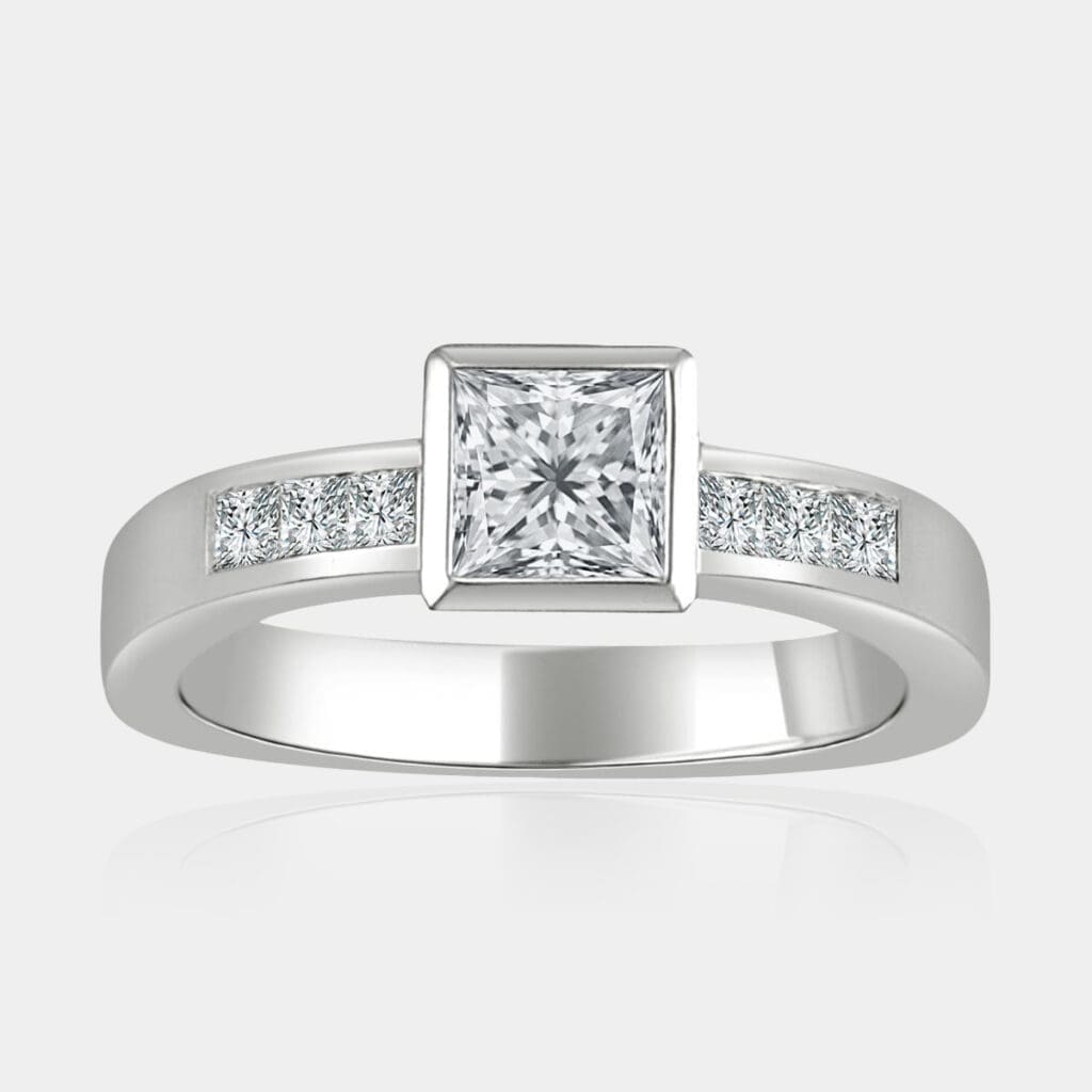 1.00 carat Princess cut diamond in bezel setting with shoulder diamonds and squared band.